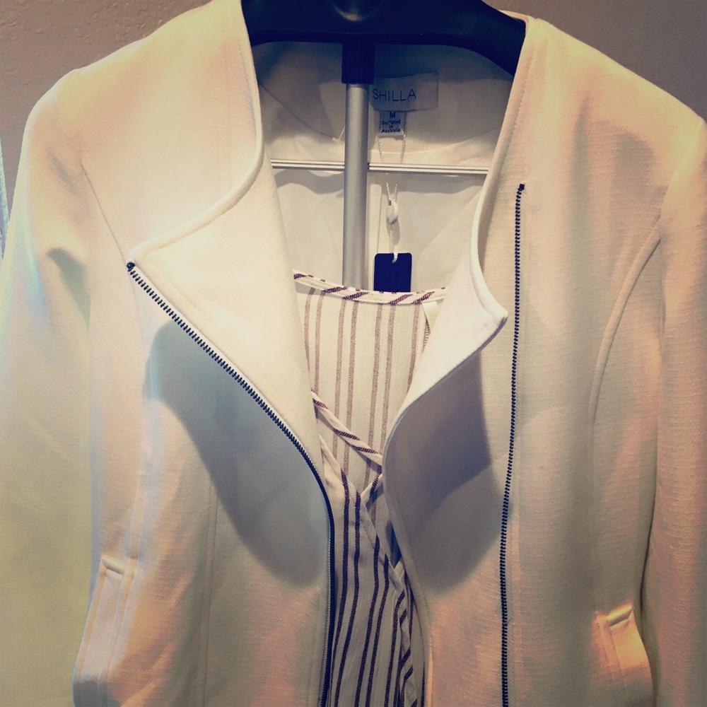 Beautiful fitted modern cream wool moto